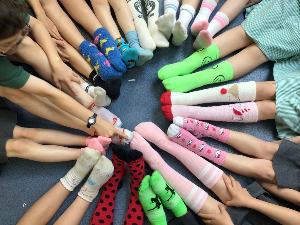 photos of colourful socks worn