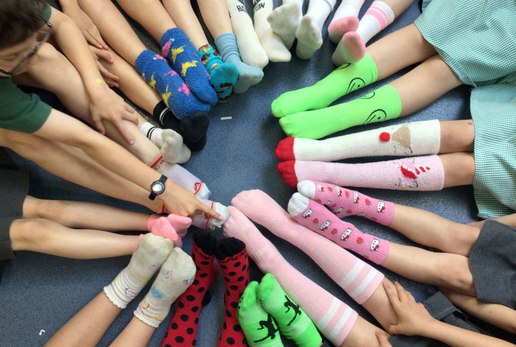 photos of colourful socks worn
